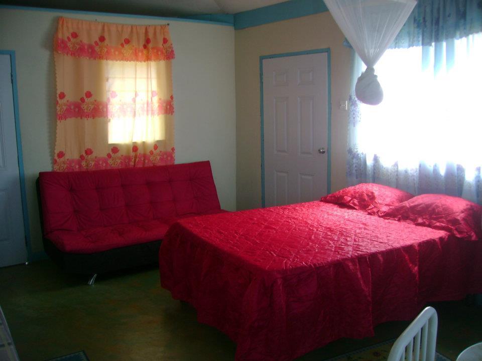 Waikiki Guest House เทรเชอร์ บีช ห้อง รูปภาพ